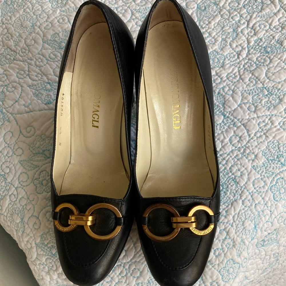 Bruno Magli Black and Gold Leather Flats with Signature Detailing